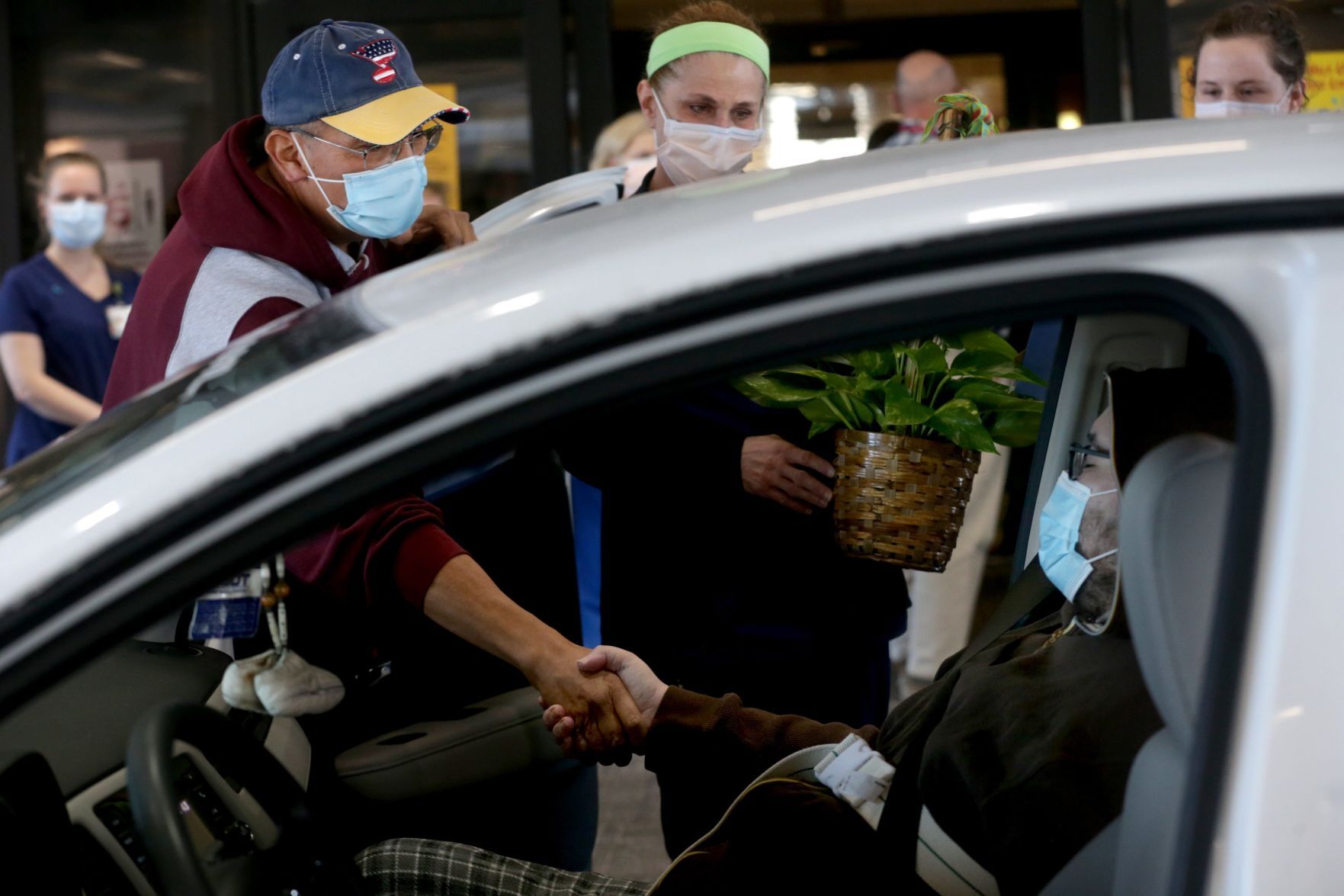 Staff cheers COVID-19 survivor Josh Miller's discharge from St. Luke's Hospital
